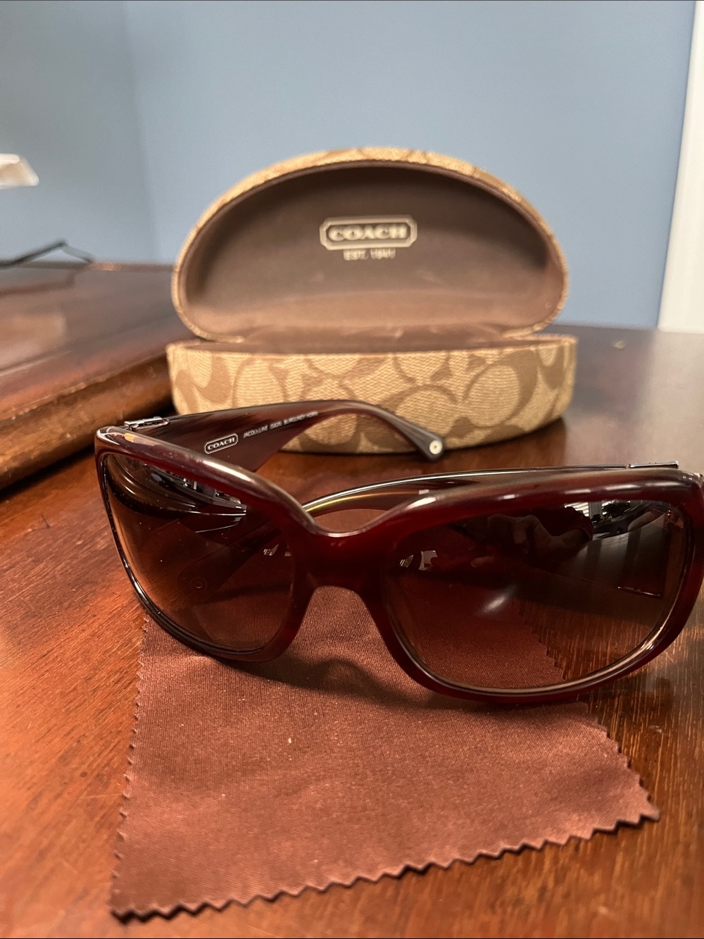 Coach Women's Sunglasses in Burgundy Frame with Dark Gradient Lenses